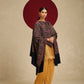 Model is wearing a Needlework pashmina shawl from shaza in midnight blue.