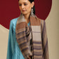 Model is wearing Pashmina check stole in brown and purple stripes.