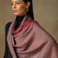 Model is wearing a Pashmina Ombre Stole in self weave in the colour foggy pink.