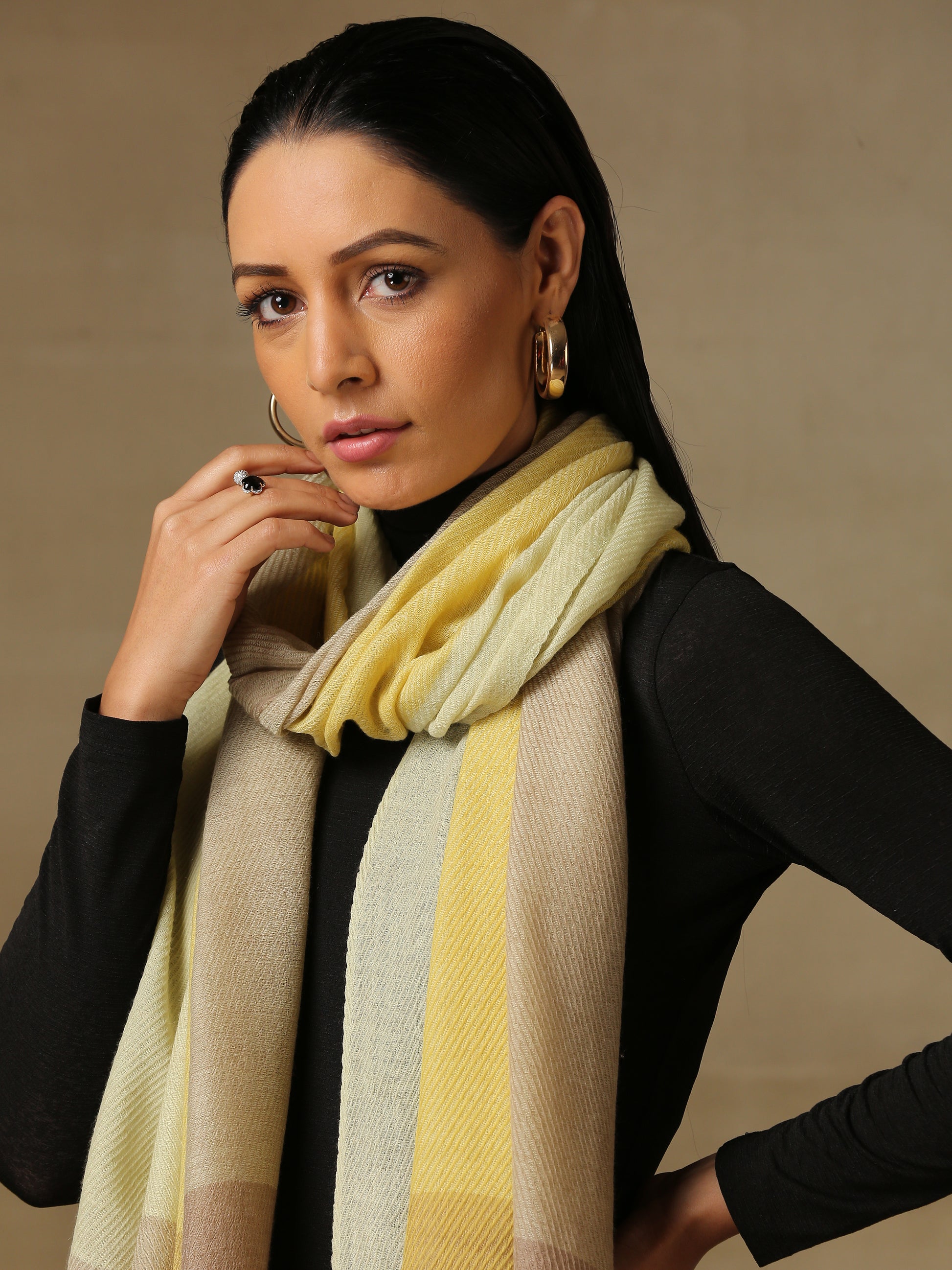 Model is wearing a Pardah stole by Shaza in lemon yellow.