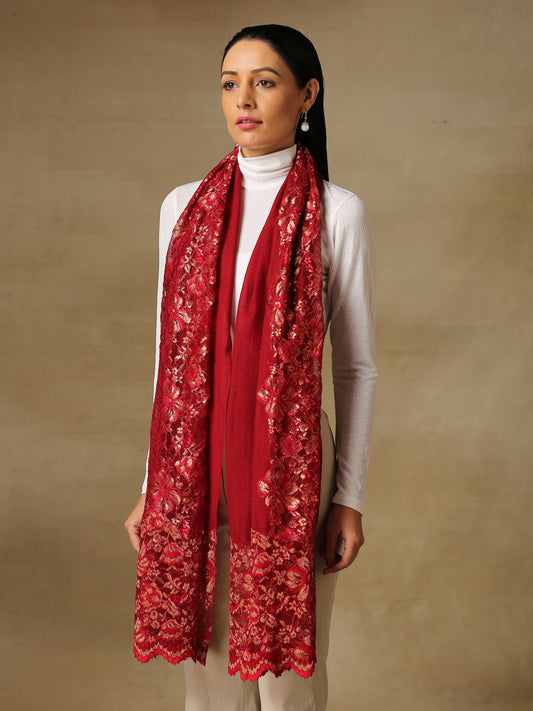 Model is wearing Celestial Chantilly stole from Shaza in red. 