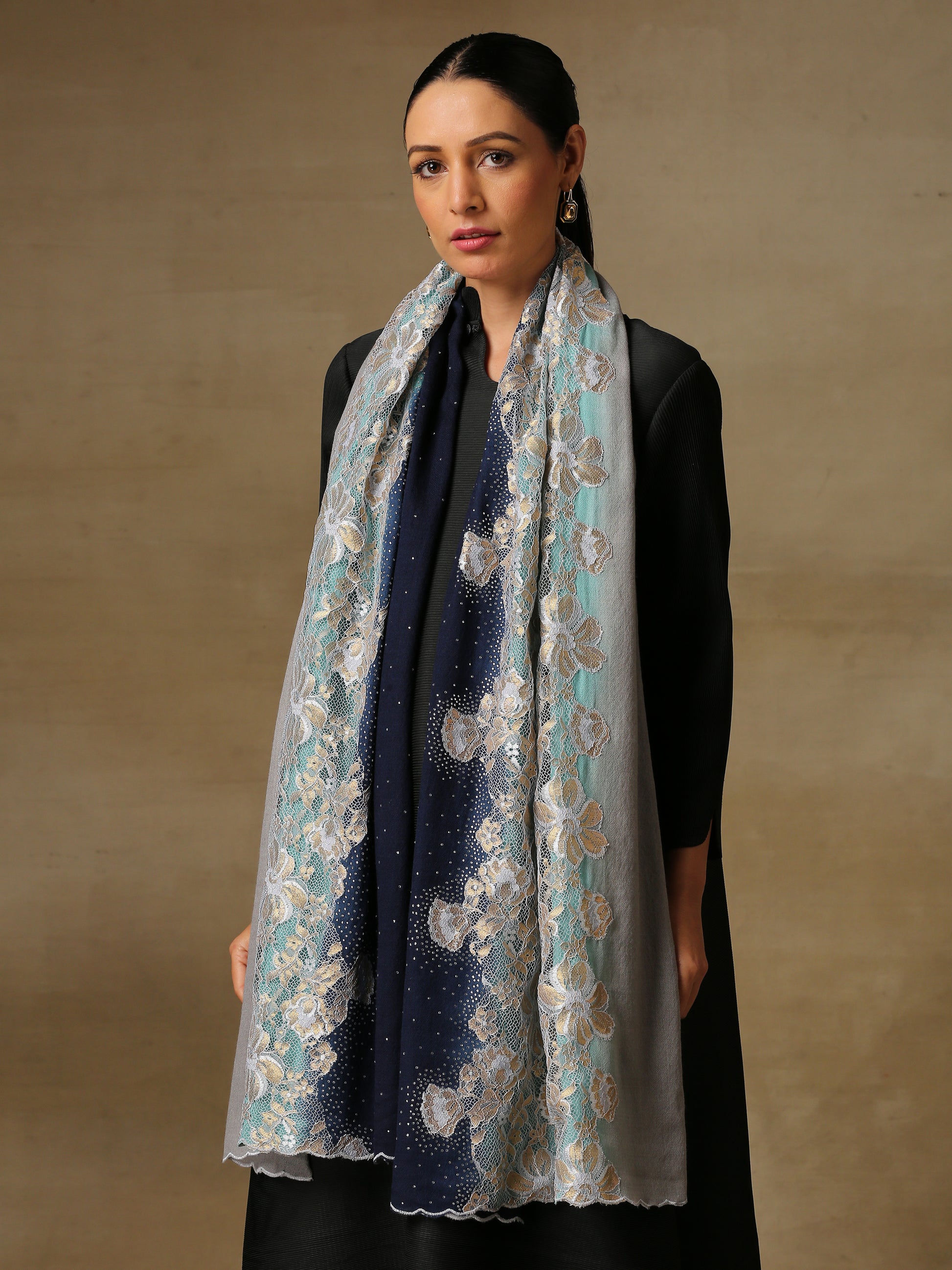 Model is wearing a Celestial Chantilly Zaywar stole from Shaza in twilight.