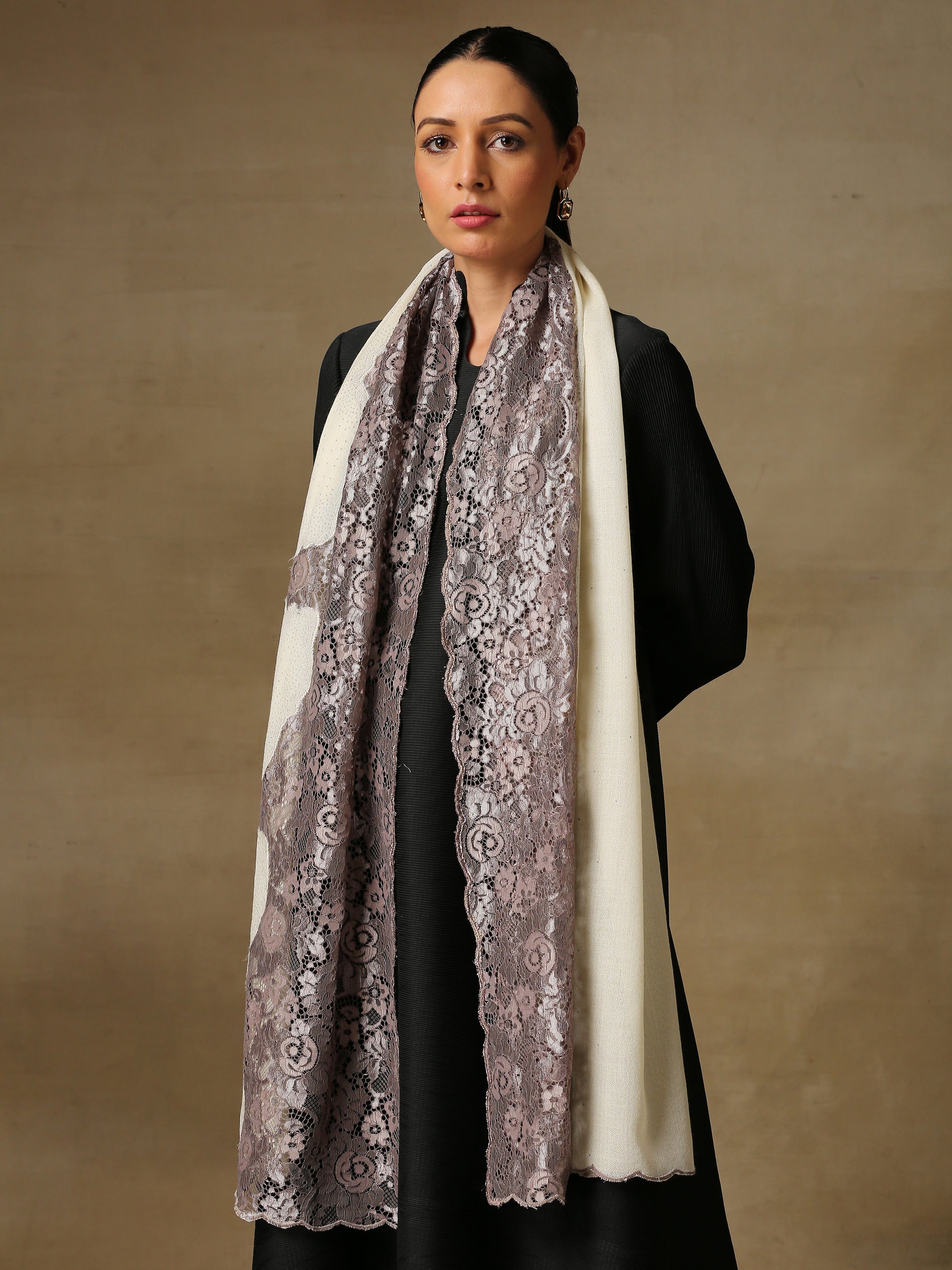 Model is wearing a Celestial Chantilly Zaywar stole from Shaza in White.
