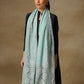 Model is wearing a Celestial Chantilly Zaywar stole from Shaza in sea green.