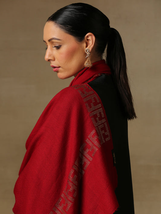 Model is wering a maroon coloured stole from the Era of Zaywar Border Swarovski Stole collection, hand embellished with gold swarovski in an abstract design.